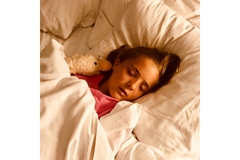 Image Child sleeping peacefully.