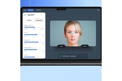 Image A womans face being scanned on a computer screen.