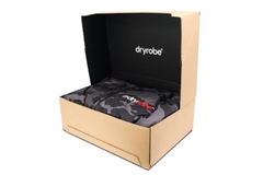 A cardboard box with a black inside and a jacket in the box.