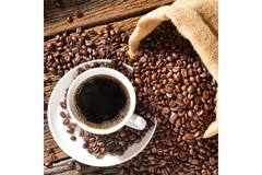 Image Coffee beans and a cup of coffee.