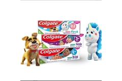 cartoon dog and unicorn next to three toothpaste boxes.