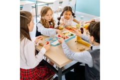 Image Kids eating at school.