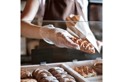 Image Person buying bakery products.