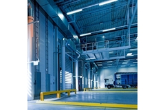 Image truck parked in an industrial facility