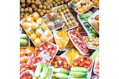 Image Fruits and vegetable wrapped in plastic food packaging.
