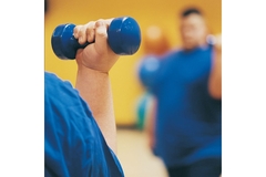 Image Overweight man lifting weights.