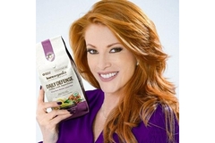 Angie Everhart holding a bag of tea.