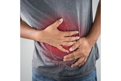 Image Man with hands on his stomach, in agony.