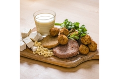 An array of plant-based meat alternative products.