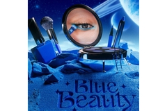 Image A drawing of a blue world with a woman putting on blue eyeshadow in a mirror.