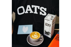 Image oatly with a cup of coffee