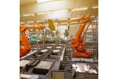 Image Automated machines at production site.