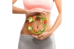 Floating salad edited in front of woman’s belly.
