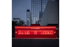 Image A Documents building from the outside lit up with red lights.