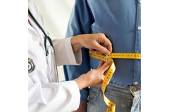 Image Measuring someone's waist.