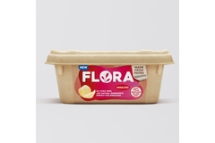 Image A brown tub made from paper is placed on the ground.