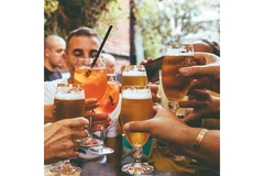 Image Friends drinking in bar.