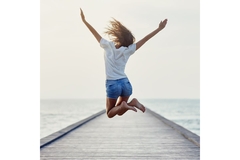 Image Woman jumping with lots of energy