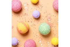 Image An array of colorful bath bombs and bubbles.