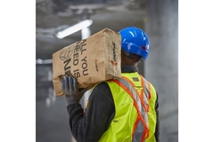 Image Worker carrying construction bag.