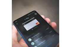 Person paying wireless with creditcard.