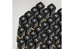 Image The top of a bunch of Chanel concealers in a clump.