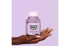 A hand holding supplements.