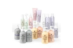 Image Hairitage products all lined up in front of a white wall.