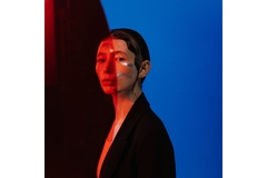 Image woman with glitter line on face poses