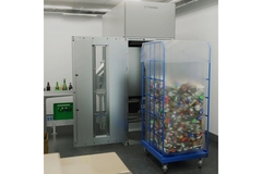 Image Drink container storage with empty bottles.
