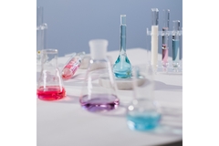 Image Lab vials with liquid in them.