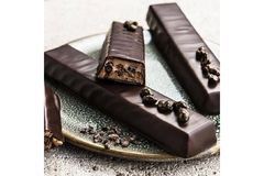 Image Chocolates are placed on a white table.
