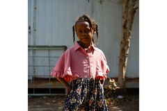 Image Little girl seeking refuge in Osma Degna School in Port Sudan after conflict spilled over into Gezira State.