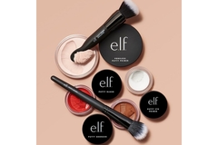 Image A bunch of ELF products on a peach background.