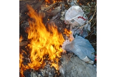 Burning packaging waste.