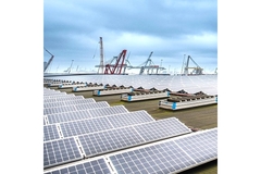 Image Solar panels on the roof of a building.