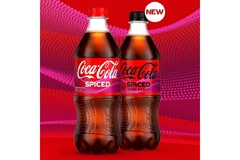 Image Black colored Coca-Cola Spiced in plastic bottle packaging.