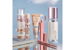 Image Revolution Beauty products in front of a sky.