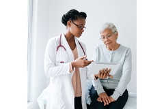 Image Doctor diagnosing malnutrition