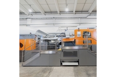 Image Packaging machine inside facility.