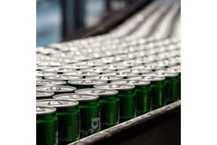 Image Beer cans on production line.