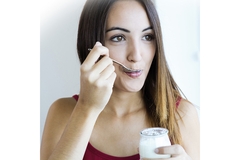 Image Woman eats Keto Kind yogurt, Nestlé winner