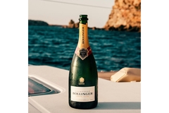 Image Champagne bottle on a boat.