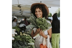 Image Woman buying vegetables.
