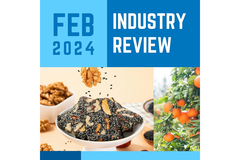 Image A blue and white logo with oranges and chia seed salad dish.