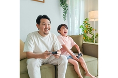 Man and child gaming