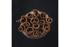 Image Cinnamon sticks are placed together.