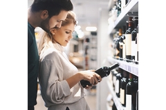 Image Couple shopping for wine.