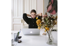 Image Woman braces herself at the computer