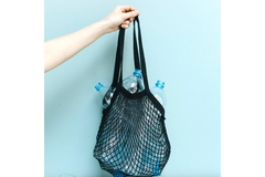 Image Shopping bag full of plastic bottles